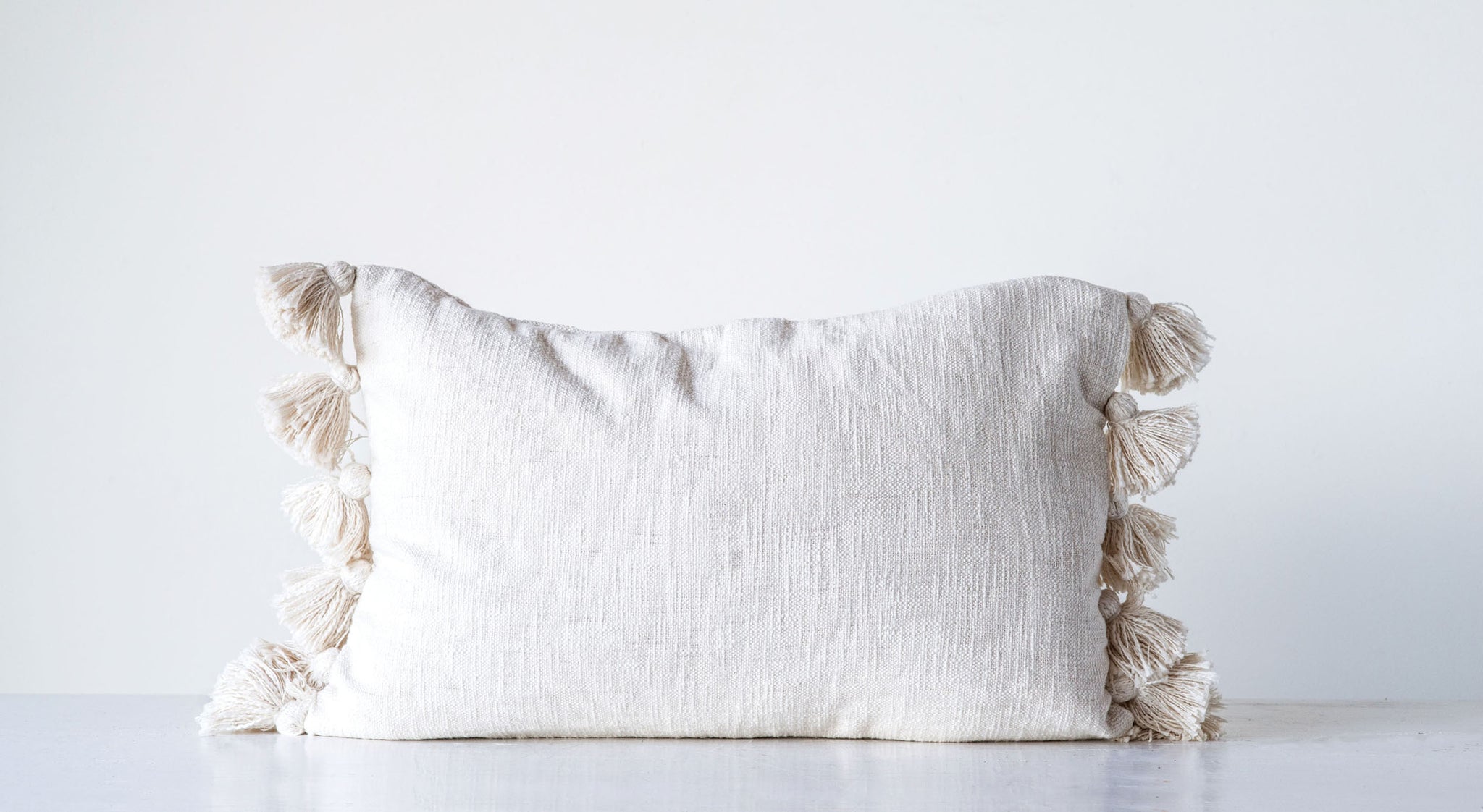 24"L x 16"H Woven Cotton Slub Lumbar Pillow w/ Tassels, Cream Color